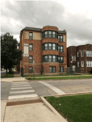 A brown brick multi-family home managed by Medallion Property Management